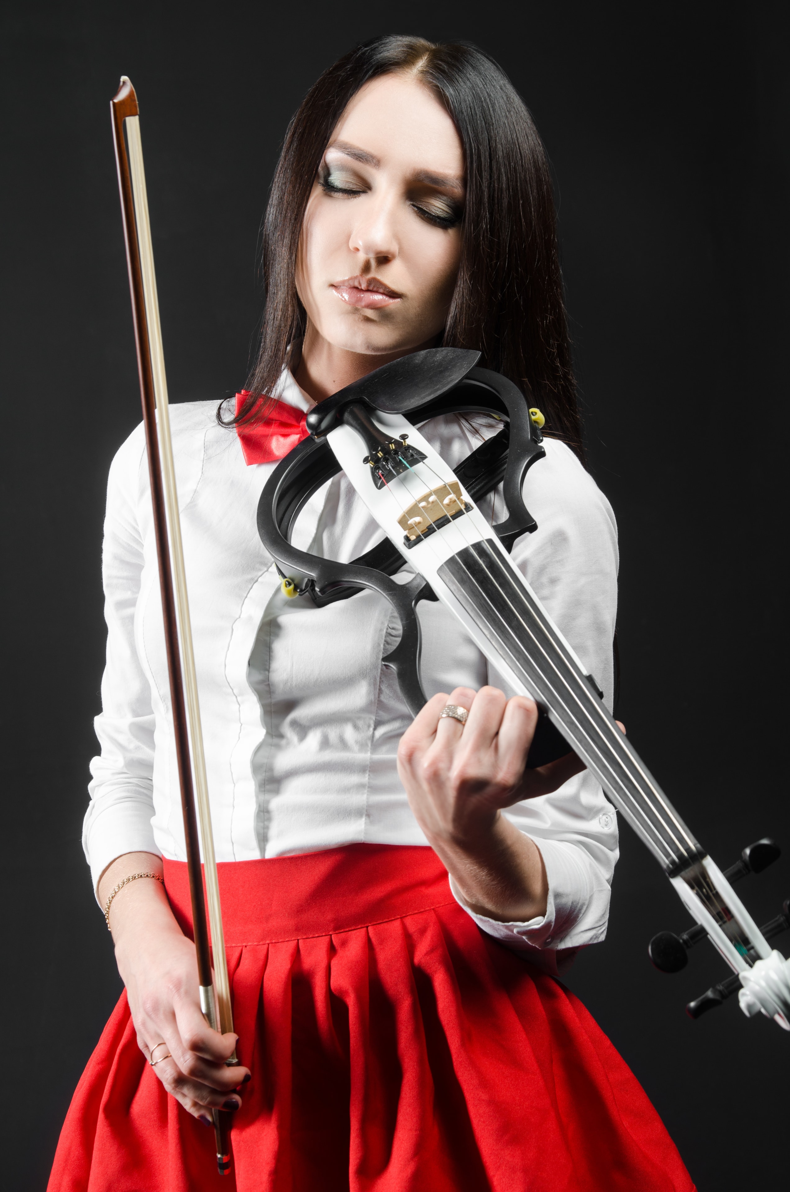 Woman playing electric violin